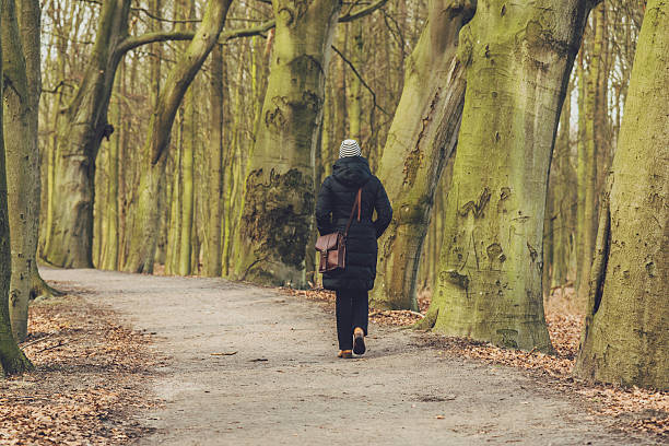 istock Woman enjoying a winter walk 467793086