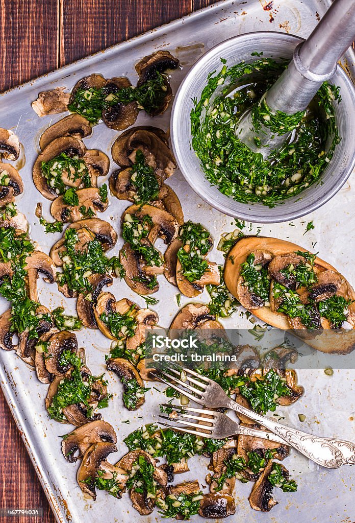 Baked mushrooms with chimichurri Baked mushrooms with chimichurri sauce 2015 Stock Photo