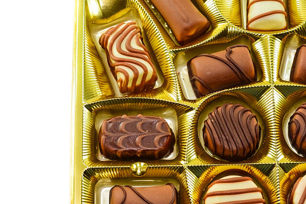 istock Chocolate sweets in an open golden box 467794570