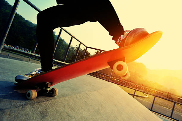 istock skateboarding jumping at  sunrise 467796162