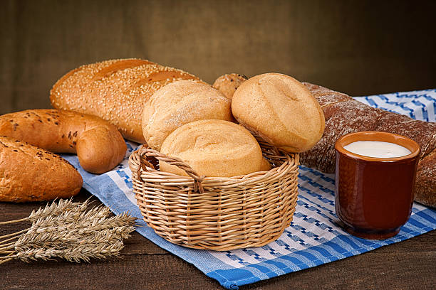 istock Bread products with milk cup on the tablecloth 467798374