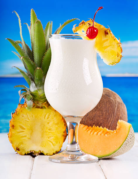 istock cocktail pina colada with fresh fruits 467801594