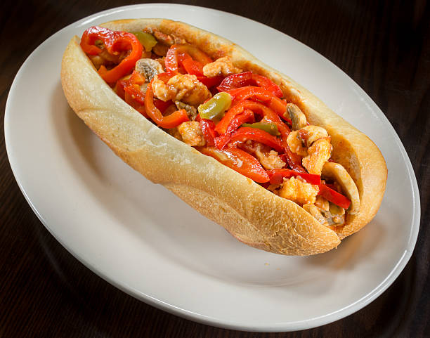 istock Chicken and Red Pepper Hero, Whole on a White Plate 467805684