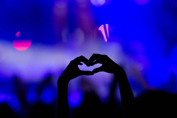 istock People during a music entertainment public concert 467810094