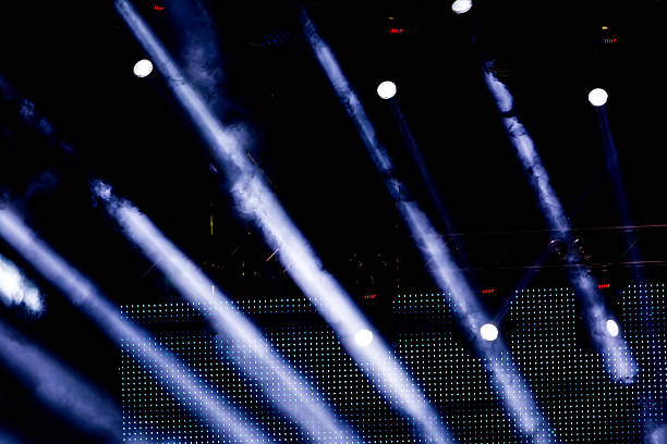istock Defocused entertainment concert lighting on stage, bokeh. 467810948
