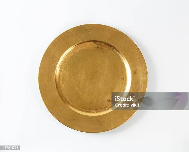 Round Gold Charger Plate Stock Photo - Download Image Now - Gold Colored, Plate, High Angle View