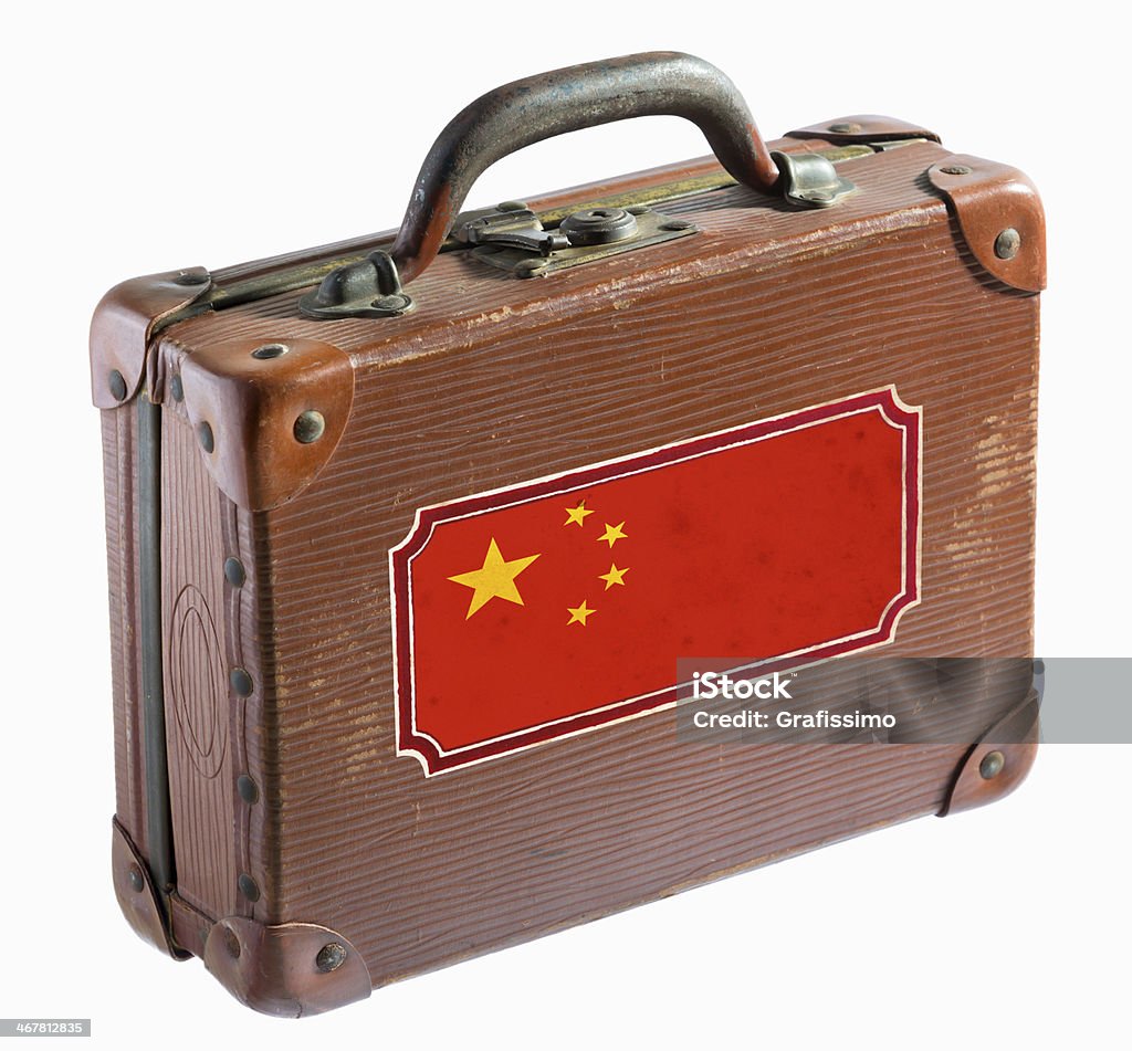 Antique leather suitcase with flag of china Antique leather suitcase with chinese flag Chinese Culture Stock Photo