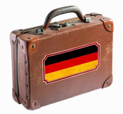 Antique leather suitcase with german flag