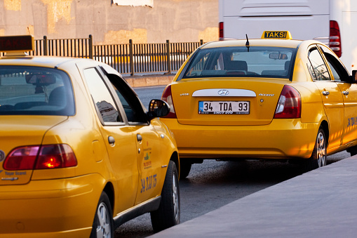 Istanbul, Turkey - August 7, 2013: Urban life on the streets of Istanbul. Taxi near Taksim Square area
