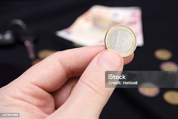 Mans Hand Holding Money Stock Photo - Download Image Now - 2015, Adult, Banking