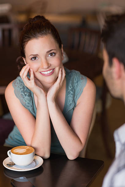 istock Young couple having coffee together 467817974