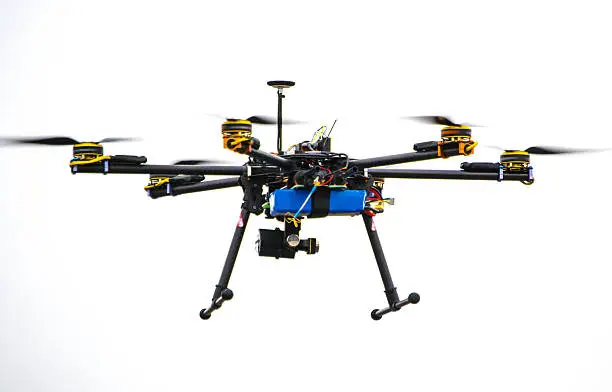 Photo of A black hexacopter drone flying