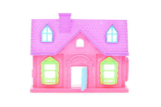 istock pink plastic doll house with opened door 467818628