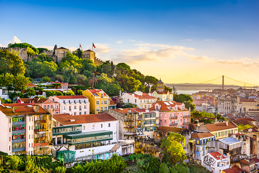 Lisbon, Portugal old town cityscape at dusk.