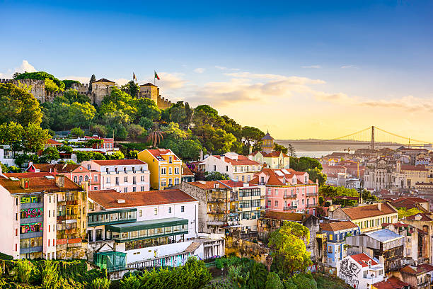 Lisbon, Portugal Skyline Lisbon, Portugal old town cityscape at dusk. castle photos stock pictures, royalty-free photos & images
