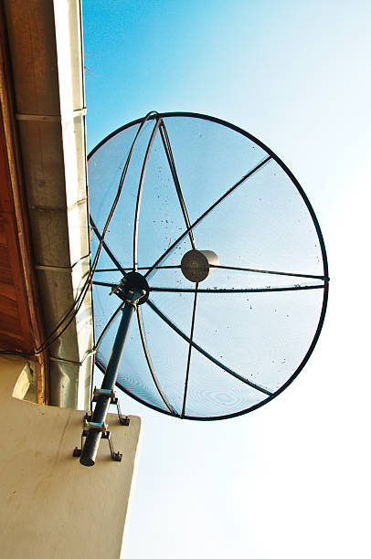 istock Satellite TV receiver on blue sky with cloud background 467824070