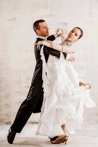 moving feet during tango dancing, black and white photo