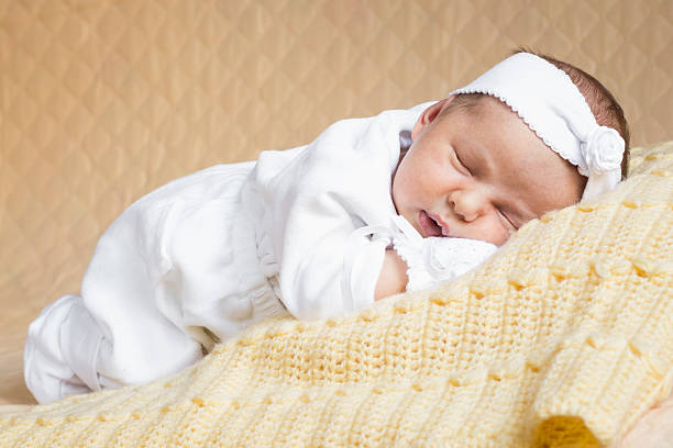 istock Newborn baby girl sleeping 467826330