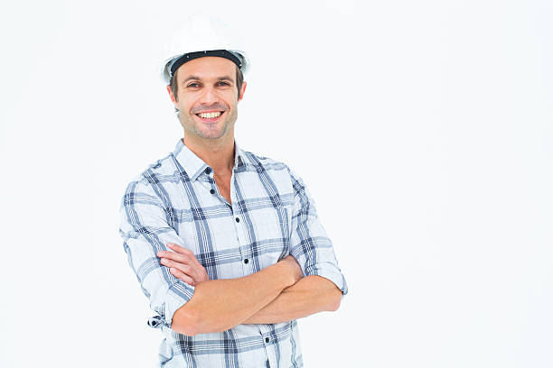 istock Architect standing arms crossed over white background 467826680