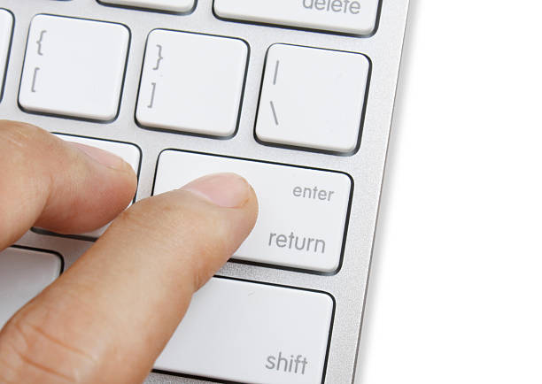 istock Fingers to keyboard buy now 467830403