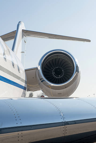 istock Close-up of business jet airplane side engine 467830892
