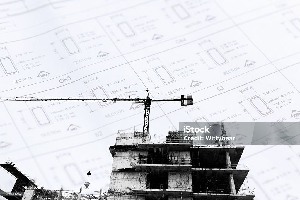Construction site with cranes on silhouette background 2015 Stock Photo