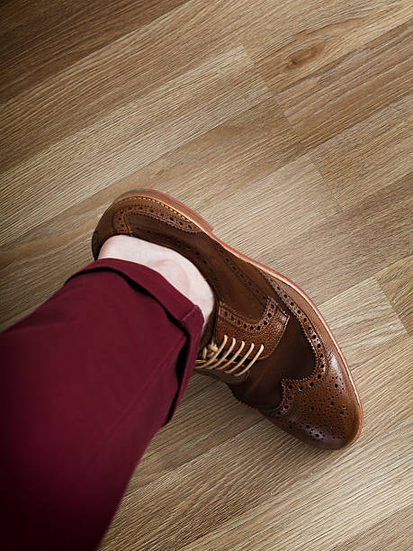 istock Sockless leg in pants and brogue 467831410