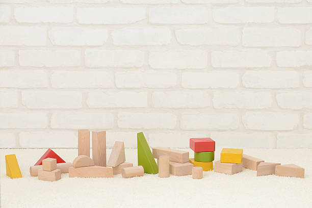 istock Wooden building blocks in playing room for babies 467832318