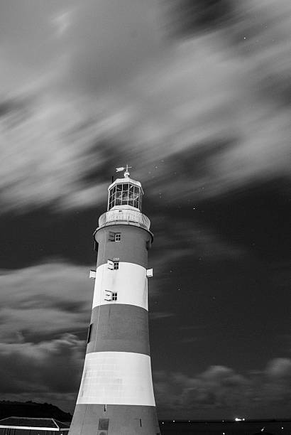 istock Smeatons tower in Plymouth at night with star trails 467834643