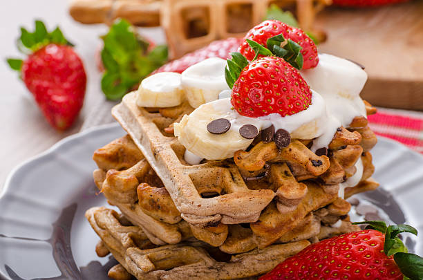 istock Belgian waffles with chocolate chips and fruits 467835966