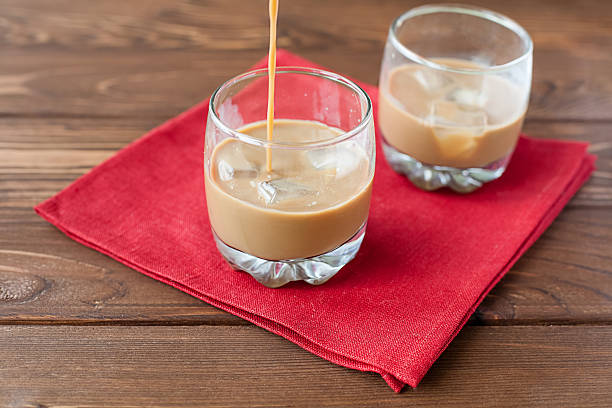 Coffee liqueur pouring in glass