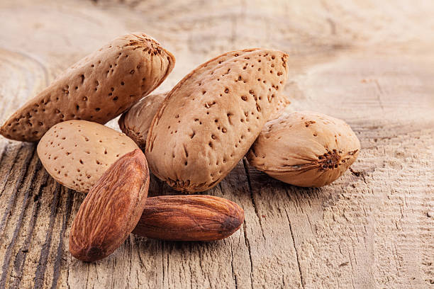 istock Almond nuts on the wooden table 467840703