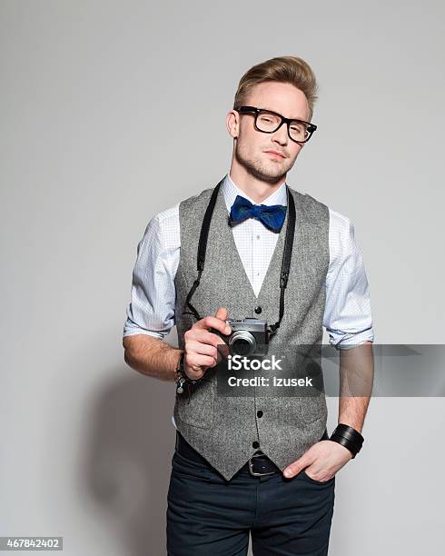 Elegant Blonde Young Businessman Wearing Tweed Vest And Bow Tie Stock Photo - Download Image Now