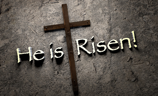 Phrase He Is Risen with cross on stone wall...3d rendering.