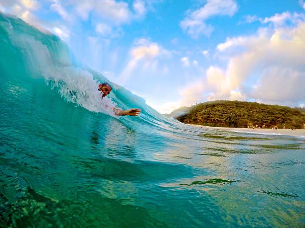 Waimea Bay Bodysurfing stock photo