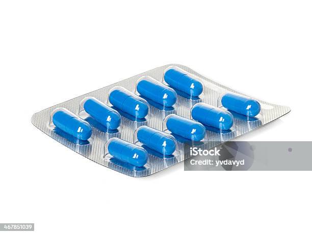 Blue Medication Capsules In Blister Pack Closeup Stock Photo - Download Image Now - Antibiotic, Assistance, Blister