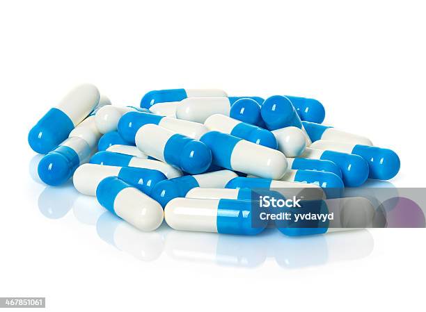 Medical Blue Pills Capsule Isolated Stock Photo - Download Image Now - Abstract, Addiction, Antibiotic
