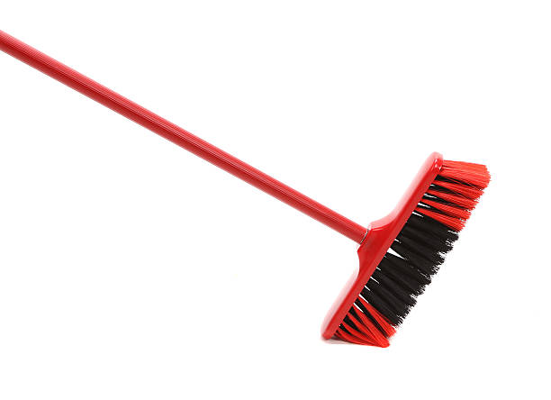 istock Close up of red black broom. 467852571