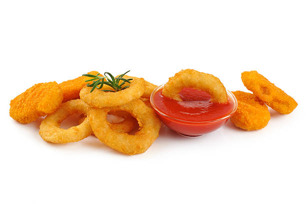 istock Nuggets, onion rings and ketchup. 467853732