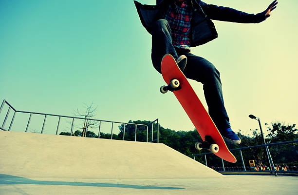 istock skateboarding jumping at  sunrise 467857540