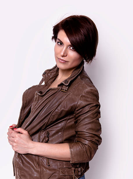istock Beautiful woman in leather jacket 467857548