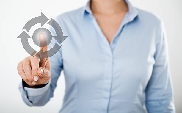 istock Businesswoman pressing button on the digital touch screen 467858440