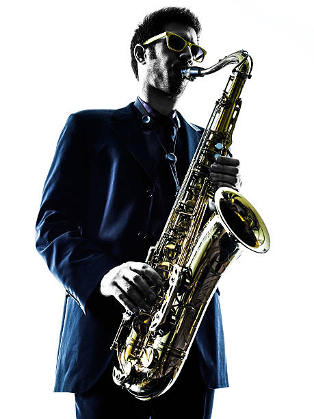 istock man saxophonist playing saxophone player  silhouette 467858738