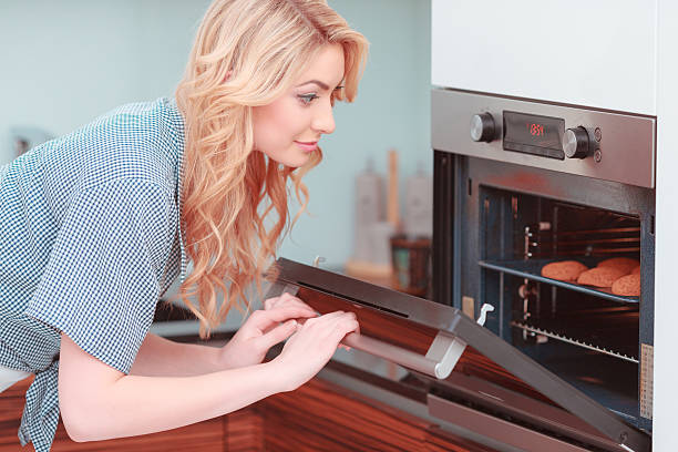istock Young attractive woman making home pastry 467862518