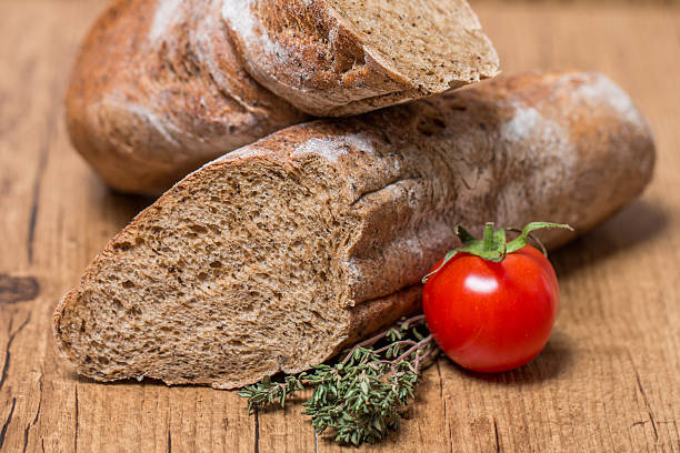 istock fresh bread baguette with tomatoes and herbs 467862696