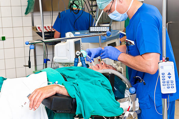istock Anesthetist placing a breathing tube 467862730