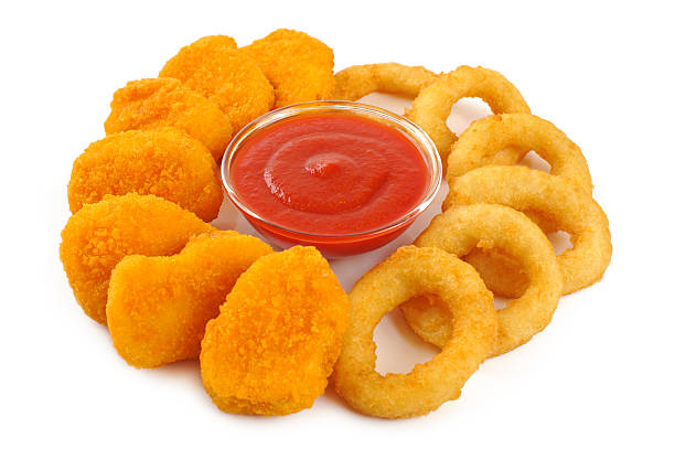 istock Nuggets, onion rings and ketchup. 467862866