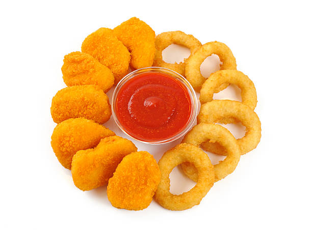 istock Nuggets, onion rings and ketchup. 467862870