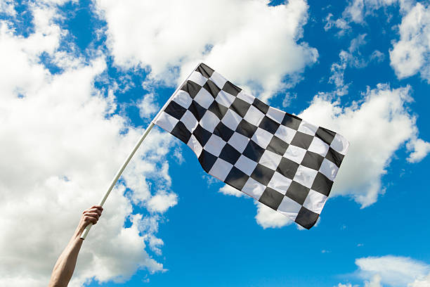 istock Checkered flag waving in the wind - outdoors shoot 467862968