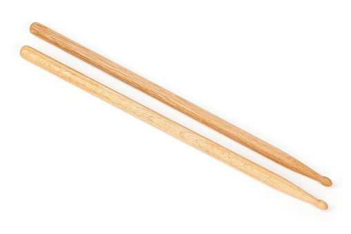 A set of two wooden drum sticks, isolated on a white background. Shot in studio with a Canon 5D Mark II DSLR camera.